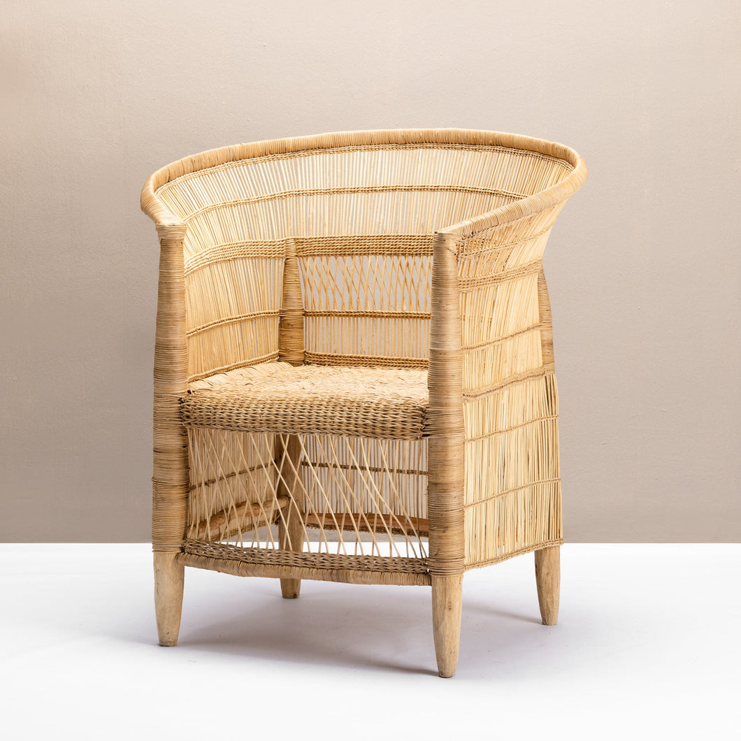 Malawi chair made of cane and water reeds material, available in black and natural colours