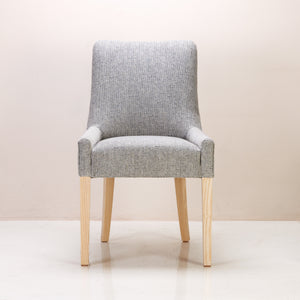 Sirius Dining Chair made of solid ash wood with polyester and cotton blend upholstery, in peyote and semi lime wash colour