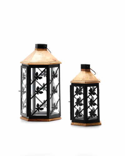 A black metal and wood butterfly lantern