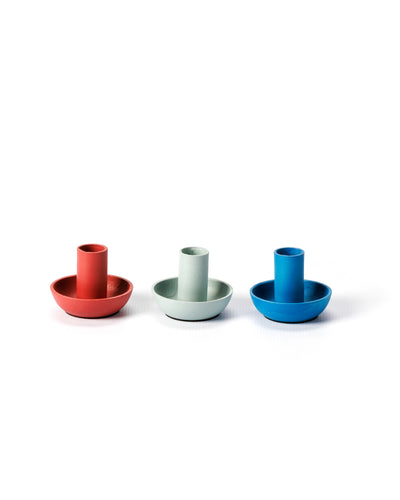 Nautical candlestick holders made of metal, available in dusty rose, process blue, and sage green