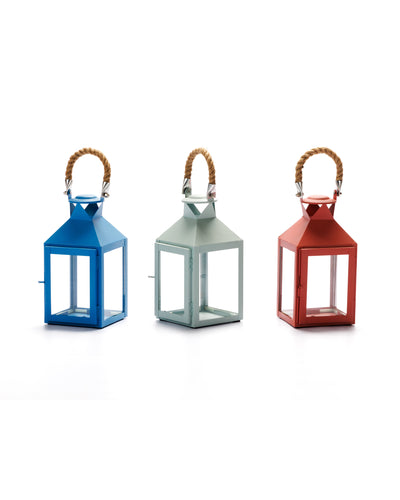 Nautical lanterns made of metal and glass, available in dusty rose, process blue, and sage green