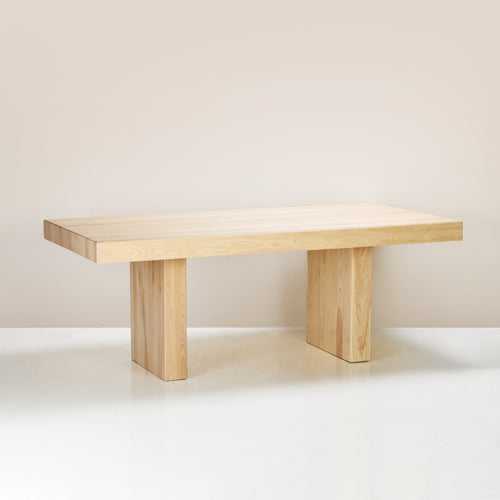 A Leo Dining Table made of solid ash wood in semi limewash colour