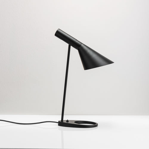 An Alien Table Lamp with a sleek and modern design, featuring a metallic body