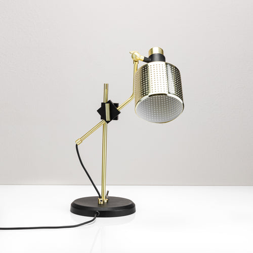Perforated Desk Lamp made of brass and metal