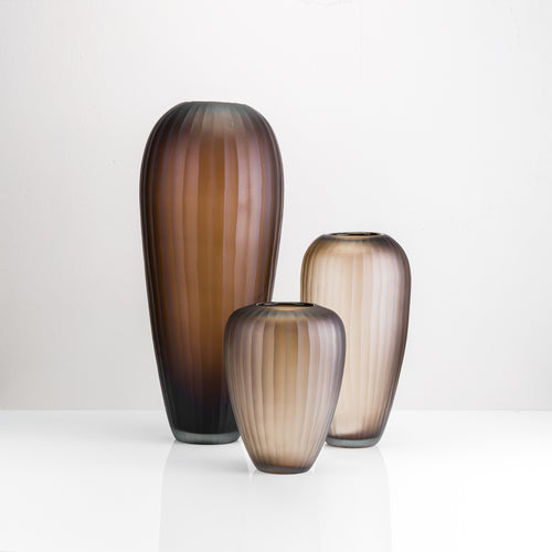 Furrowed glass vase available in small, medium, and large sizes