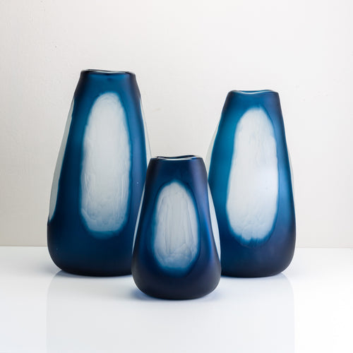 A blue spot glass vase