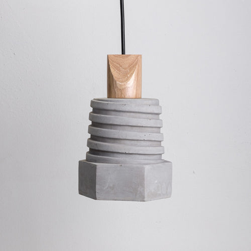 Novel urban pendant light in trendy concrete and wooden detail.