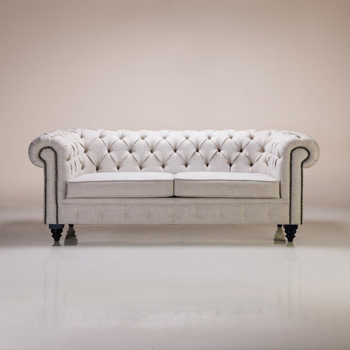 A Chesterfield Sofa upholstered in linen, made with Hertex and Partisan materials