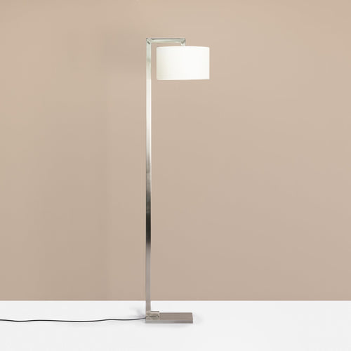 A chrome white hanging shade floor lamp
