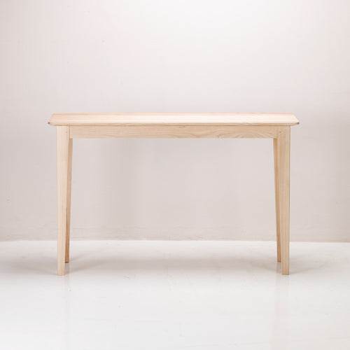 A Copenhagen Console made of solid ash wood with a semi-lime wash colour