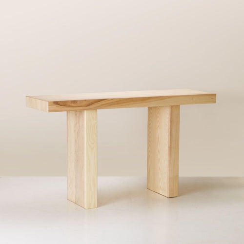A Leo Console made of solid ash wood in semi limewash colour